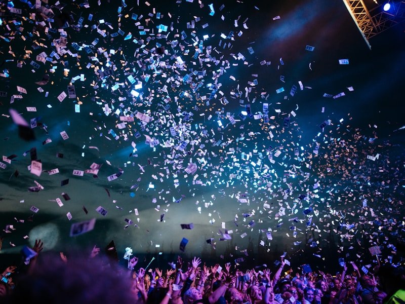 Live event finale with confetti over an energized audience
